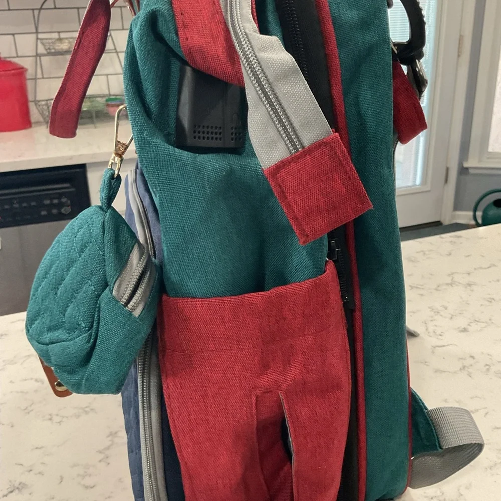 NWOT Good Mum Quilted Multi-Color Backpack w Changing Station USB. Teal Navy Red